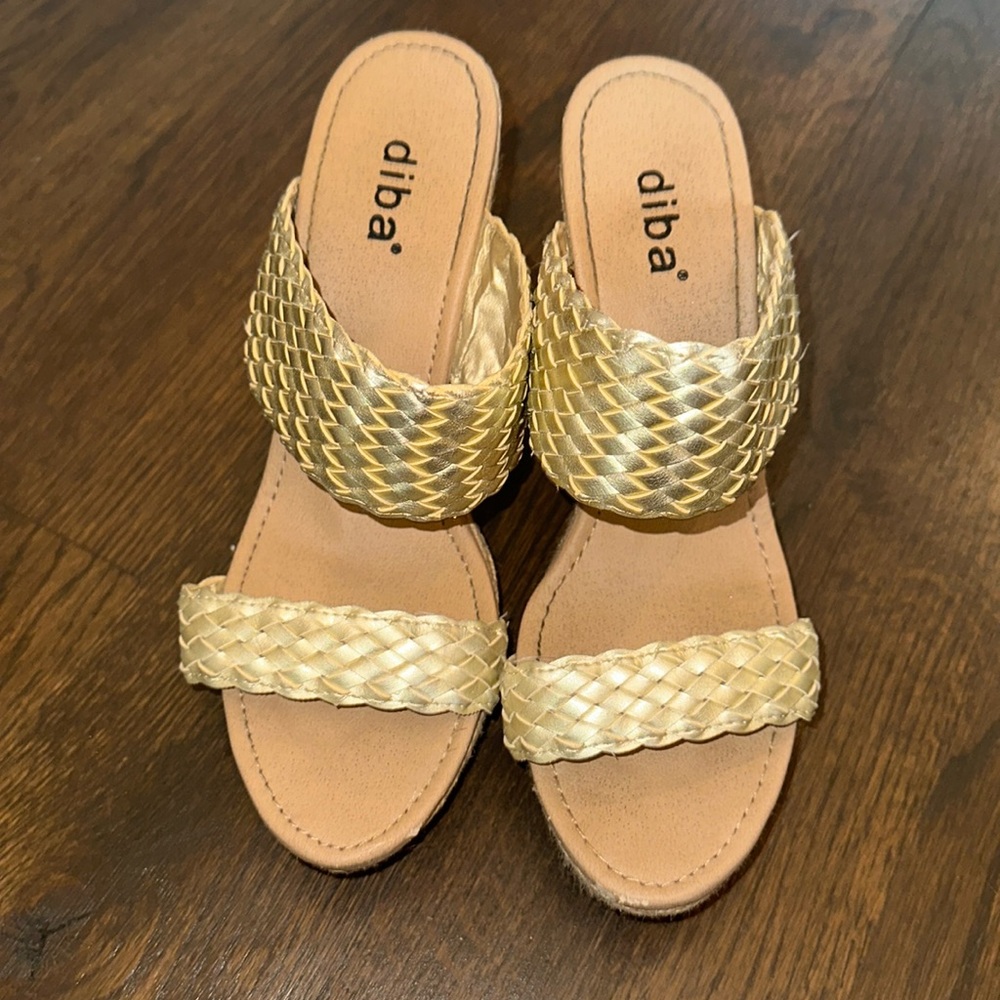 Gold wedge espadrilles, size 9. Platform  1 inch, heel length 4 & 1/2 inches.